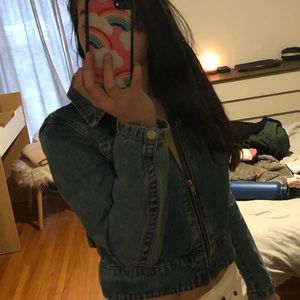 Cropped jean jacket with a zip up